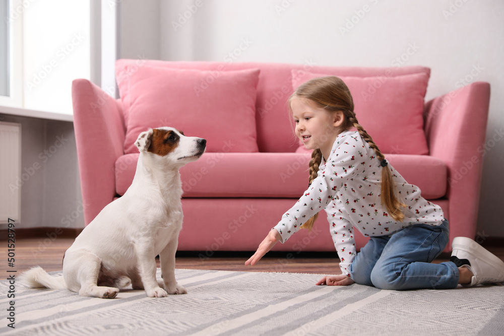 Sticker cute little girl playing with her dog at home. childhood pet