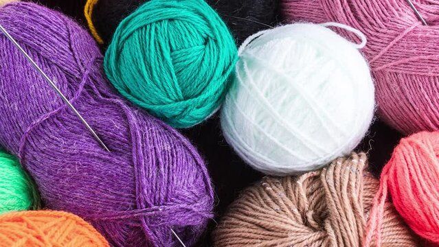 The photo shows the knitting needles with a ball