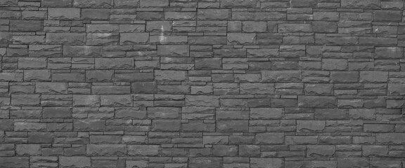 old masonry black stone wall