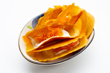 Thai crispy pancakes on white background.