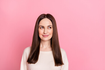 Fototapeta premium Photo of creative mind smart smiling lady watch advert empty space wear long sleeve shirt isolated pink pastel color background