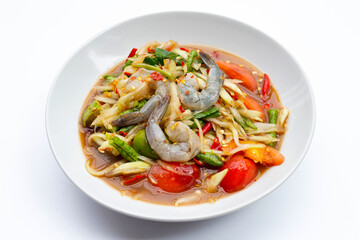 Papaya salad with shrimp in white plate