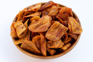 Banana slice chips on white background.