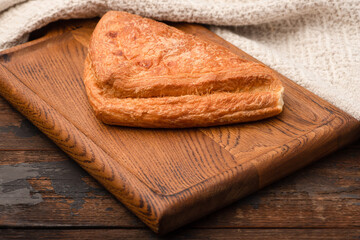 Samsa, samsa with different fillings, wooden background