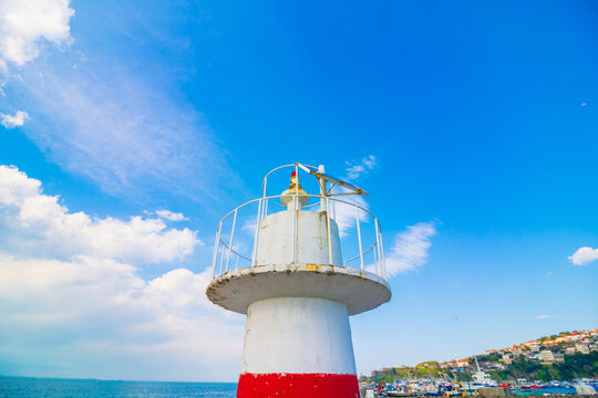 Mole Lighthouse. A white and red colored mole lighthouse