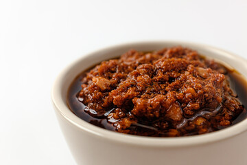 Tomato pesto on a white background