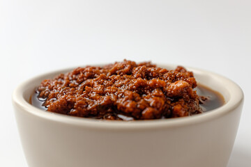 Tomato pesto on a white background