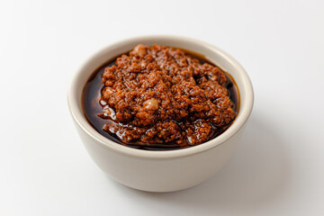 Tomato pesto on a white background