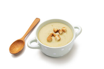 cream soup of vegetables with bread croutons isolated on white background