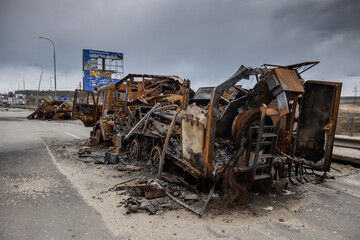Hostomel, Kyev region Ukraine - 09.04.2022: Cities of Ukraine after the Russian occupation. Military vehicles that burned down after being hit by a shell.