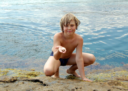 child playing on the beach