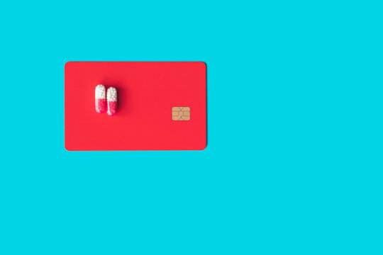 pills on a credit card. concept - credit for treatment.