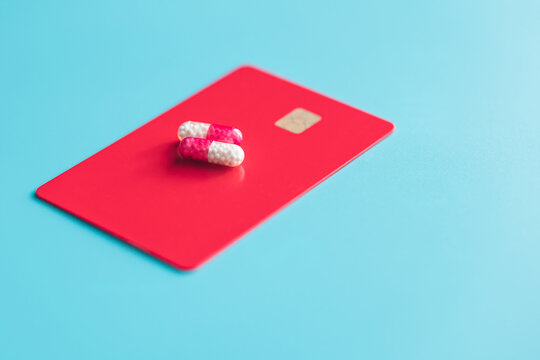 pills on a credit card. concept - expensive drugs.