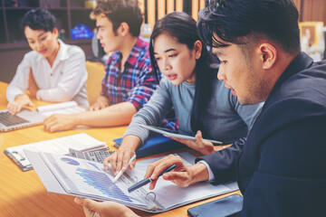 Crop image of business people meeting to discuss the situation on the year plan marketing.	