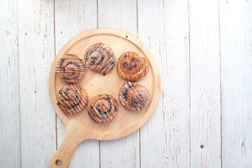  top view of cinnamon danish roll on table 