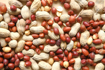 Processed pea nuts in a bowl on table top down .