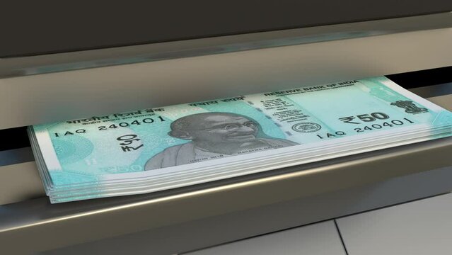 50 Indian rupees  in cash dispenser. Withdrawal of cash from an ATM. Financial transaction in the bank terminal. INR.