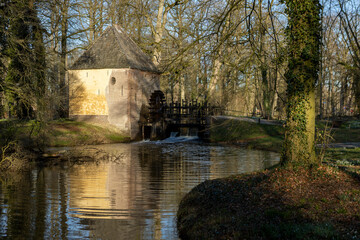 Obraz premium Facility water management at Hackfort castle among winter barren trees