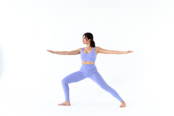 young woman practicing yoga on white background