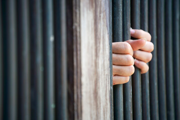 Obraz premium hands in jail