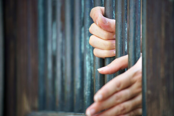 Obraz premium hands in jail