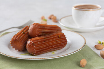 Tulumba Dessert served with Turkish coffee