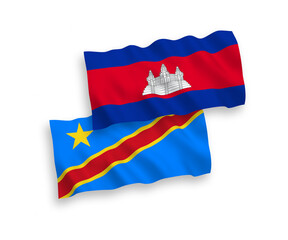 National vector fabric wave flags of Kingdom of Cambodia and Democratic Republic of the Congo isolated on white background. 1 to 2 proportion.