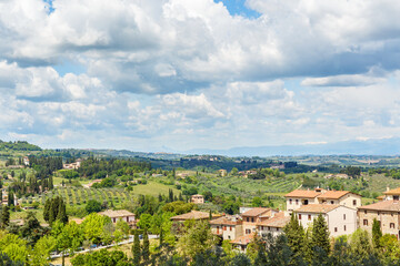 Fototapeta na wymiar Tuscan landscape view of rolling hills from a village