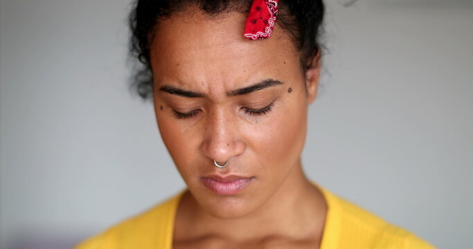 Sad Young Black Woman Looking Down. Depressed Thoughtful Mixed Race Girl