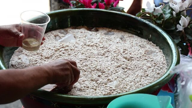 Making Mexican Maize and Cacao beverage Drink (Tejate)