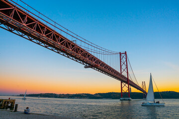 Lisbon, Portugal - november 14 2022 - Bridge of april 25th (Ponte 25 de Abril) crossing the Duoro...