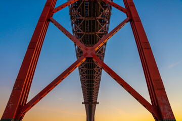 Lisbon, Portugal - november 14 2022 - Detail of the Bridge of april 25th (Ponte 25 de Abril) crossing the Duoro river