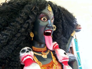 Goddess Kali face closeup with dangerous expressions. indian festival Navratri.