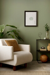 Stylish composition of living room interior with mock up, green wall, white armchair with brown pillow. Mock up poster. Template.