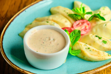 Dumplings di patate with basil and tomato sauce