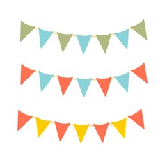 Obraz premium Colored flags for the holiday. Holiday and goodies. Simple birthday decorations. Children's entertainment, carnival and circus!