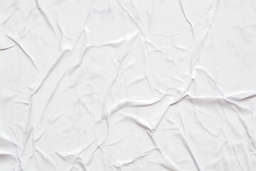 Blank white crumpled and creased paper poster texture background