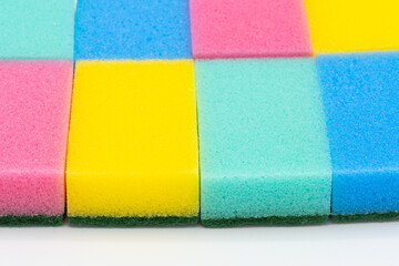Colorful cleaning sponges, abstract background