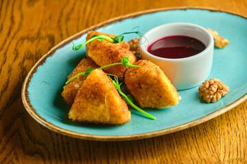 Breaded mozzarella cheese balls with