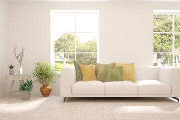 White living room with sofa and summer landscape in window. Scandinavian interior design. 3D illustration