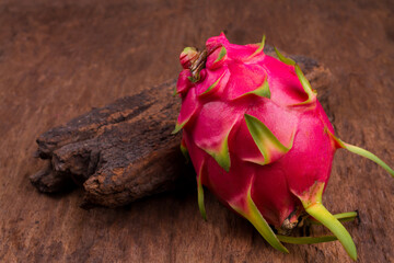 Dragon Fruit On old Wooden Table background