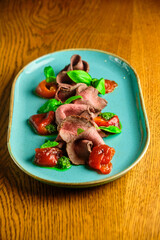 Meat flakes with basil