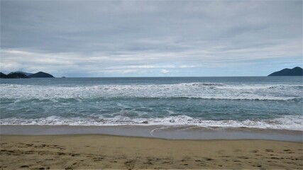 Beach landscape with the sky and the sea on the horizon