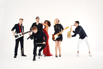 Young international musicians, a band performing. The concept of music, hobby, festival....