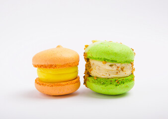Fresh bright colored macaroons or macaroons isolated on white background.Berry macaroons.Sweet macaroon dessert.