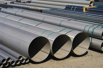 New stainless steel pipes of different diameters are stacked, the goods are ready for shipment,...