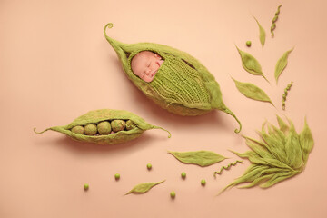 Newborn photographed as a pea in a peapod.