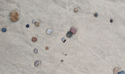 stones on the sand. Coast of the Baltic Sea. Curonian Spit, Kaliningrad region, Russia. Beach.
