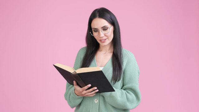 Focused lady read favorite book isolated pstel color background