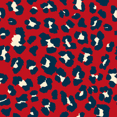 Seamless leopard pattern print in deep red, navy and off-white. 